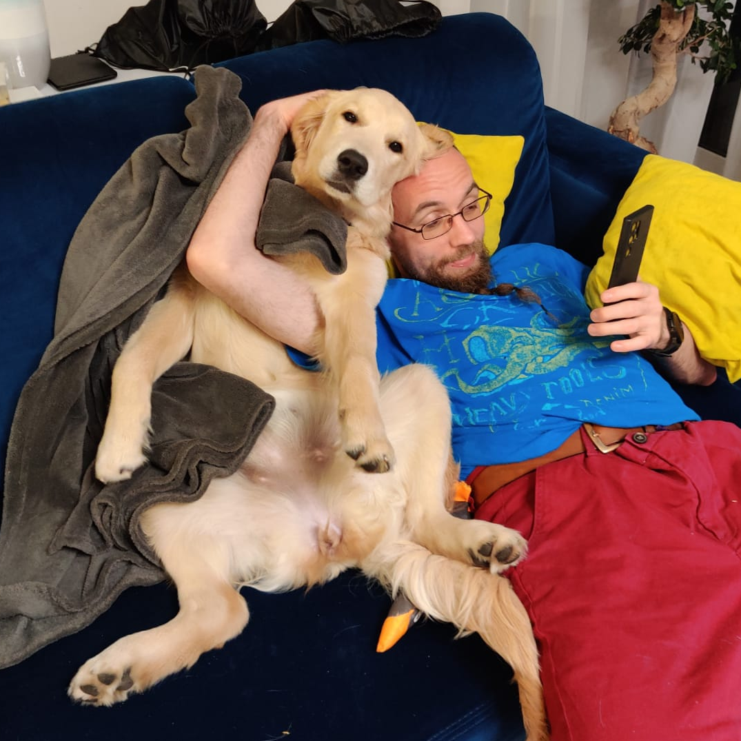 Adam trapped by a Golden Retriever